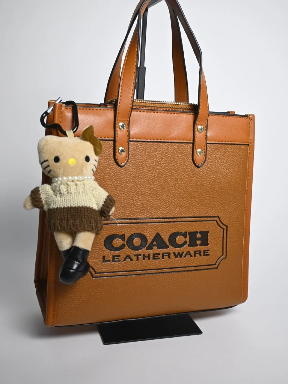 Coach Tan Pebbled Leather Logo Tote with Charm